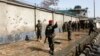 Afghan National Army soldiers keep watch at the site of attack in Kabul March 9, 2013. 