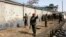 Afghan National Army soldiers keep watch at the site of attack in Kabul March 9, 2013. 