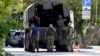 FILE - Russian servicemen get into a truck in Southern Russian city of Rostov-on-Don on Sept. 7, 2023, prior to Russia's local elections. 
