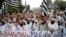 Pakistani protesters shout slogans to condemn a cartoon contest by Dutch parliamentarian, in Lahore, Pakistan, Aug. 17, 2018. 