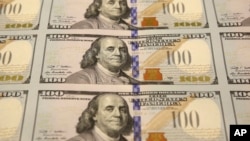 Новая $100-я купюра 