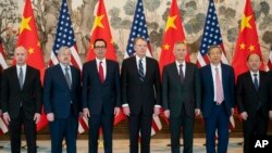 2019年3月29日美中贸易谈判代表在北京合影.