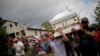 Friends and family carry a coffin with the remains of Jakelin Caal, 7, who died while in the custody of U.S. Customs and Border Protection, during her funeral at her home village of San Antonio Secortez, in Guatemala, Dec. 25, 2018.