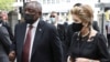 South African President Cyril Ramaphosa greets Elita de Klerk, widow of former President FW de Klerk at the state memorial service in Cape Town, South Africa, Dec. 12, 2021. 