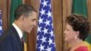 US President Barack Obama, left, shakes hands with Brazilian President Dilma Vana Rousseff, right, following their joint news conference at the Palacio do Planalto in Brasilia, Brazil, Saturday, March 19, 2011. "