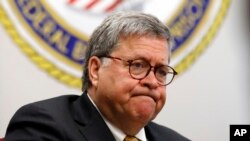 FILE - Attorney General William Barr speaks at a federal prison in Edgefield, S.C., July 8, 2019. The Justice Department says it will execute federal death row inmates for the first time since 2003. Five inmates will be executed starting in December.