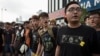Student protesters shout slogans outside the Golden Bauhinia Square, venue of the official flag-raising ceremony for celebrations of China's National Day, in Hong Kong Oct. 1, 2014. 