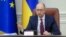 Ukrainian Prime Minister Arseniy Yatsenyuk speaks during a cabinet meeting in Kyiv, Ukraine, Nov. 25, 2015. 