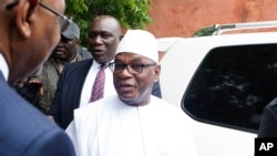 Le président Ibrahim Boubacar Keita arrive dans un bureau de vote à Bamako, au Mali, le 12 août 2018.