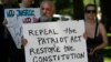 Protesters rally outside the U.S. Capitol against the NSA's recently detailed surveillance programs in Washington, D.C., June 13, 2013.