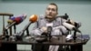 FILE - Valery Spiridonov, who has volunteered to be the first person to undergo a head transplant, attends a news conference in Vladimir, Russia, June 25, 2015. 