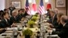 Japanese Foreign Minister Fumio Kishida, left, and Defense Minister Gen Nakatani, second from left, attend a meeting with U.S. Secretary of State John Kerry, third from right, and Secretary of Defense Ashton Carter, not visible, in New York, April 27, 201