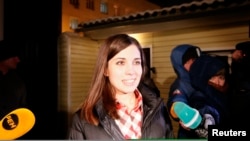 A man slides down a snow-covered hill in the northwest of Washington, D.C. Some 4 to 6 inches (10 to 15 cm) of snow fell in the city overnight, bringing closures to schools and government offices.