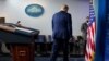 FILE - President Donald Trump walks away after speaking at the White House, in Washington, Nov. 5, 2020.