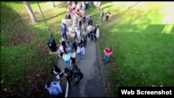 Undergraduate students that share a group identity, walk to a library square on the Sussex campus, while researchers film the event to observe that behavior