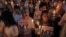 Members of the "White Shirt" movement hold a candlelight vigil to demand democratic elections and political reforms in Bangkok, Thailand, Jan. 24, 2014. 