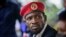 FILE - Penantang presiden oposisi Bobi Wine, berbicara kepada media di luar rumahnya, di Magere, dekat Kampala, di Uganda, 26 Januari 2021.
