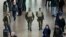 Belgian soldiers patrol the departure hall of Zaventem international airport near Brussels, Nov. 22, 2015, after security was tightened in Belgium following the fatal attacks in Paris.