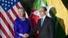 U.S. Secretary of State Hillary Rodham Clinton, left, and Burma President Thein Sein shake hands before a meeting at Le Meridien Hotel in Siem Reap, Cambodia, July 13, 2012.