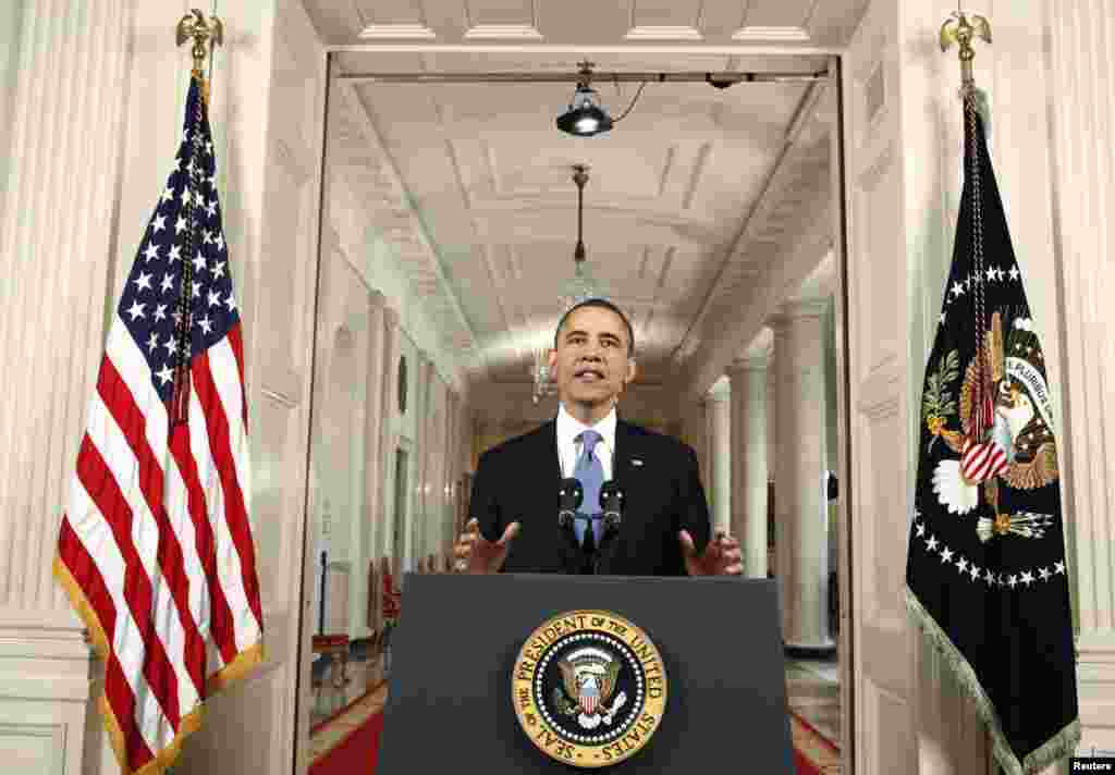 美国总统奥巴马在白宫东厅宣布最高法院对他政府的医改立法的裁决。