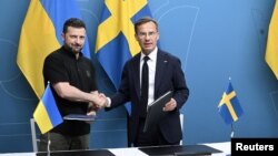 اولف کریسترسون، نخست وزیر سوئد و ولودیمیر زلنسکی، رئیس‌جمهور اوکراین