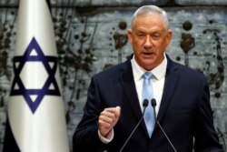 FILE - Benny Gantz, leader of Blue and White party, speaks at the President's residence, in Jerusalem, Oct. 23, 2019.