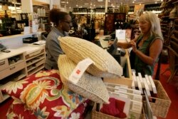 FILE - A customer buys pillows from a Pier 1 Imports store in Dallas, Texas, June 19, 2008.