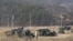 FILE - U.S. Army armored vehicles are seen during a military exercise in Yeoncheon, South Korea, near the border with North Korea, South Korea, Feb. 27, 2019. 