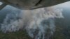 Fire consumes an area near Porto Velho, Brazil, Aug. 23, 2019. Brazilian state experts have reported a record of nearly 77,000 wildfires across the country so far this year, up 85% over the same period in 2018. 