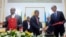 President of the Republic of Angola Joao Lourenço (C) shakes hands with Rwandan president Paul Kagame (R) next to Ugandan President Yoweri Museveni (L) after the signing an agreement, Aug. 21, 2019, in Luanda, Angola.