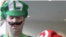 Attendees at Comic Con in San Diego dress up as the Mario brothers game characters.