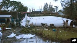Rongsokan pesawat Fokker yang jatuh di Goma, Kongo (4/3). 