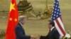 U.S. Secretary of State John Kerry, left, and Chinese Foreign Minister Wang Yi shake hands after a news conference following meetings at the Ministry of Foreign Affairs in Beijing, May 16, 2015. 