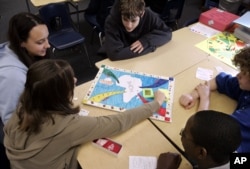 FILE — Eighth-grade social studies students at Mount Hebron School in Montclair, New Jersey, play a game they devised based on the story of the revolt on the slave ship Amistad.