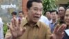 Cambodian Prime Minister Hun Sen gestures after casting his ballot in local elections at Ta Khmau town, in Kandal province, file photo. 