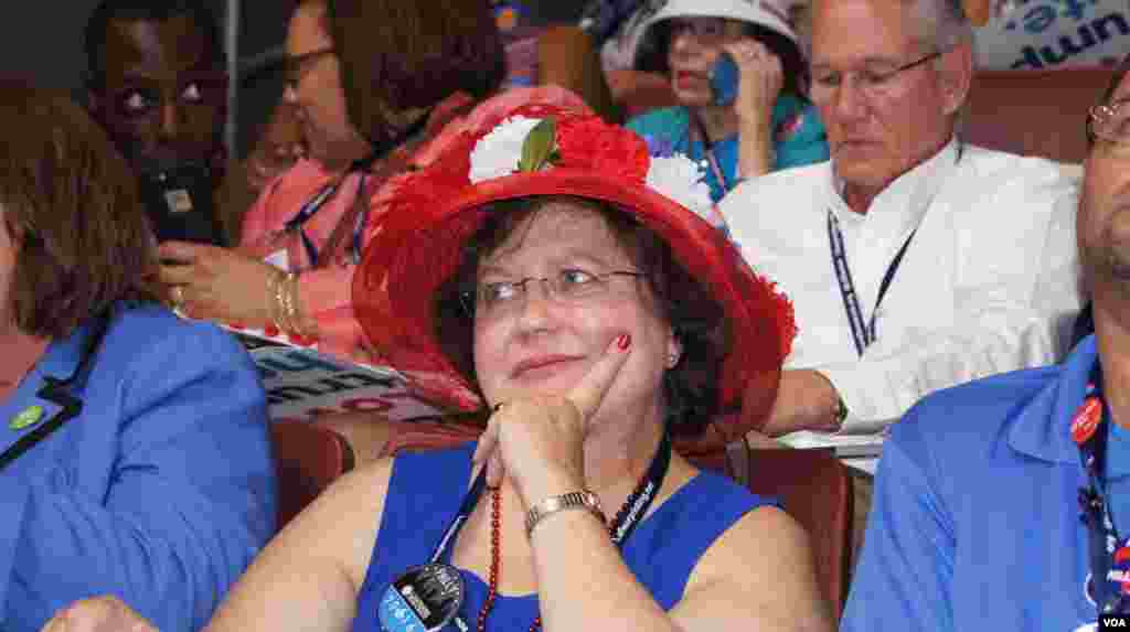 Delegates sport their hats at the DNC in Philadelphia (Photo: S. Barua/VOA)
