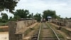 A bamboo train railroad over a bridge passing a pond, in Battambang, on July 21, 2017. The railroad will be repaired in the upcoming months. (Sun Narin/VOA Khmer)