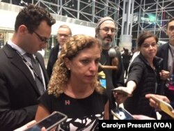Debbie Wasserman Schultz, former Democratic National Committee chairwoman, is interviewed at the Jacob Javits Convention Center, where the Hillary Clinton campaign is holding a party, in New York, Nov. 8, 2016.