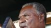 Zambia's new President Michael Sata, right, takes the oath of office on the steps of the supreme court in Lusaka, Zambia, Friday Sept. 23, 2011. 