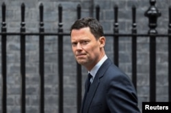 司法部长亚历克斯-查克