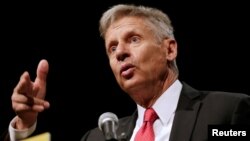 게리 존슨 전 뉴멕시코 주지사가 29일 플로리다주 올랜도에서 열린 미국 자유당 전당대회에서 대통령 후보 수락 연설을 하고 있다.