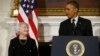 President Barack Obama stands with Janet Yellen, vice chair of the Board of Governors of the Federal Reserve System, in the State Dining Room of the White House in Washington, Wednesday, Oct. 9, 2013.