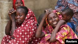 Relatives of missing school girls react in Dapchi in the northeastern state of Yobe, after an attack on the village by Boko Haram, Nigeria, Feb. 23, 2018. 
