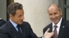 France's President Nicolas Sarkozy (L) welcomes Mustafa Abdel Jalil (C), chairman of the Libyan National Transitional Council (NTC), and Mahmoud Jibril (R), the head of Libya's rebel National Transitional Council, prior to the opening of the "Friends of L
