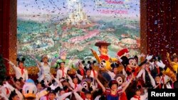 FILE- Dancers perform during the groundbreaking ceremony of Shanghai Disneyland in Pudong, China, April 8, 2011.