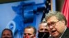 Attorney General William Barr talks to the media during a news conference about Operation Legend, a federal task force formed to fight violent crime in several U.S. cities, in Kansas City, Missouri, Aug. 19, 2020.