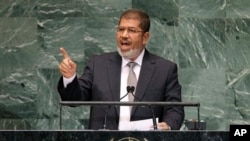 Mohammed Morsi, President of Egypt, addressing 67th session of the United Nations General Assembly, U.N. headquarters in New York, Sept. 26, 2012.