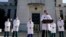 U.S. Navy Commander Dr. Sean Conley, the White House physician, is flanked by other doctors as he speaks to the media about U.S. President Donald Trump's health, at Walter Reed National Military Medical Center in Bethesda, Maryland, Oct. 4, 2020.