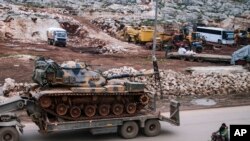 Turkish army artillery arrives in the east of Idlib, Syria, Feb. 15, 2020.