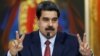 Presiden Venezuela Nicolas Maduro berbicara pada konferensi pers di Istana Miraflores, Caracas, Venezuela, Jumat (25/1).